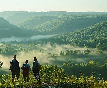 Beginning a Kentucky road trip near Mammoth Cave National Park, where rolling karst landscapes set the tone for exploring caves in Kentucky to visit.