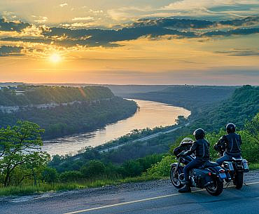 Family motorcycle stopped at a Mississippi River overlook near Grafton on an Illinois motorcycle road trip along the Great River Road.