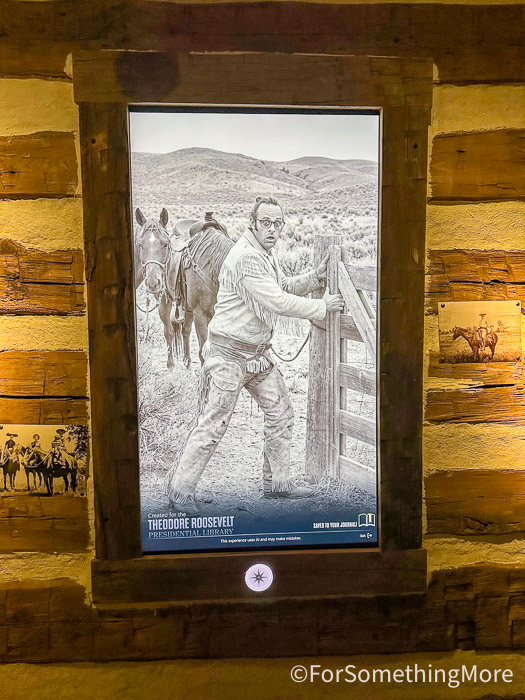Kids exploring an interactive exhibit inside the Theodore Roosevelt Presidential Library.