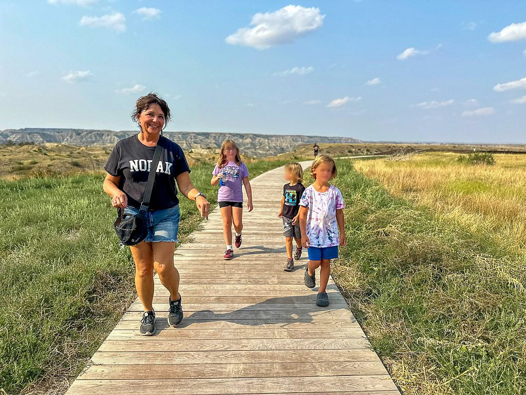 Multigenerational family visiting the Theodore Roosevelt Presidential Library with kids in Medora, North Dakota.