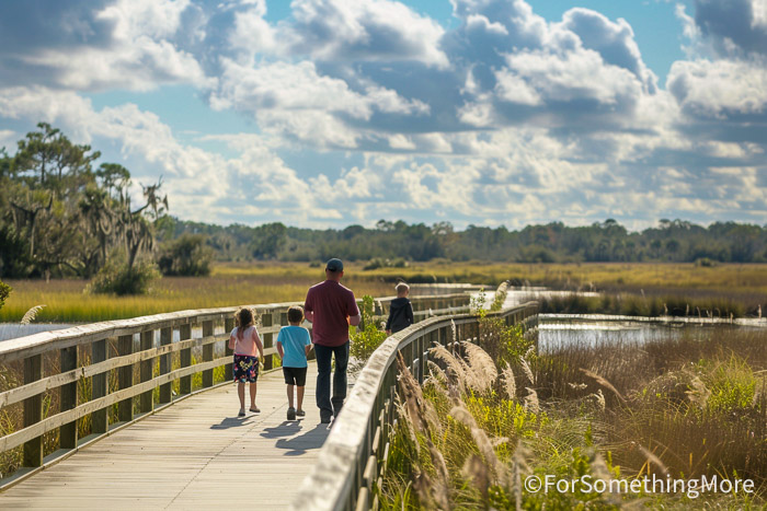Family hiking at Paynes Prairie Preserve State Park during a Florida with kids outdoor adventure.
