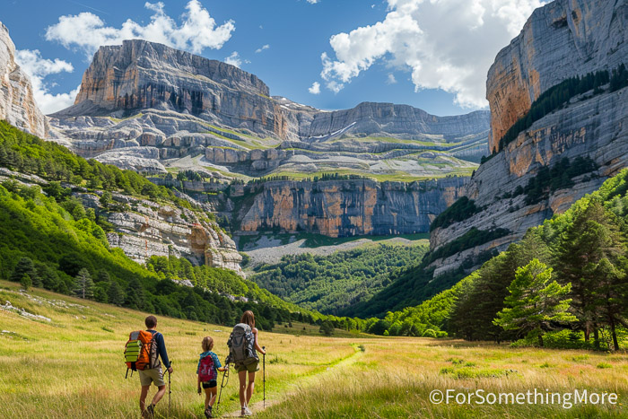 Family hiking in Ordesa y Monte Perdido National Park in the Spanish Pyrenees.
